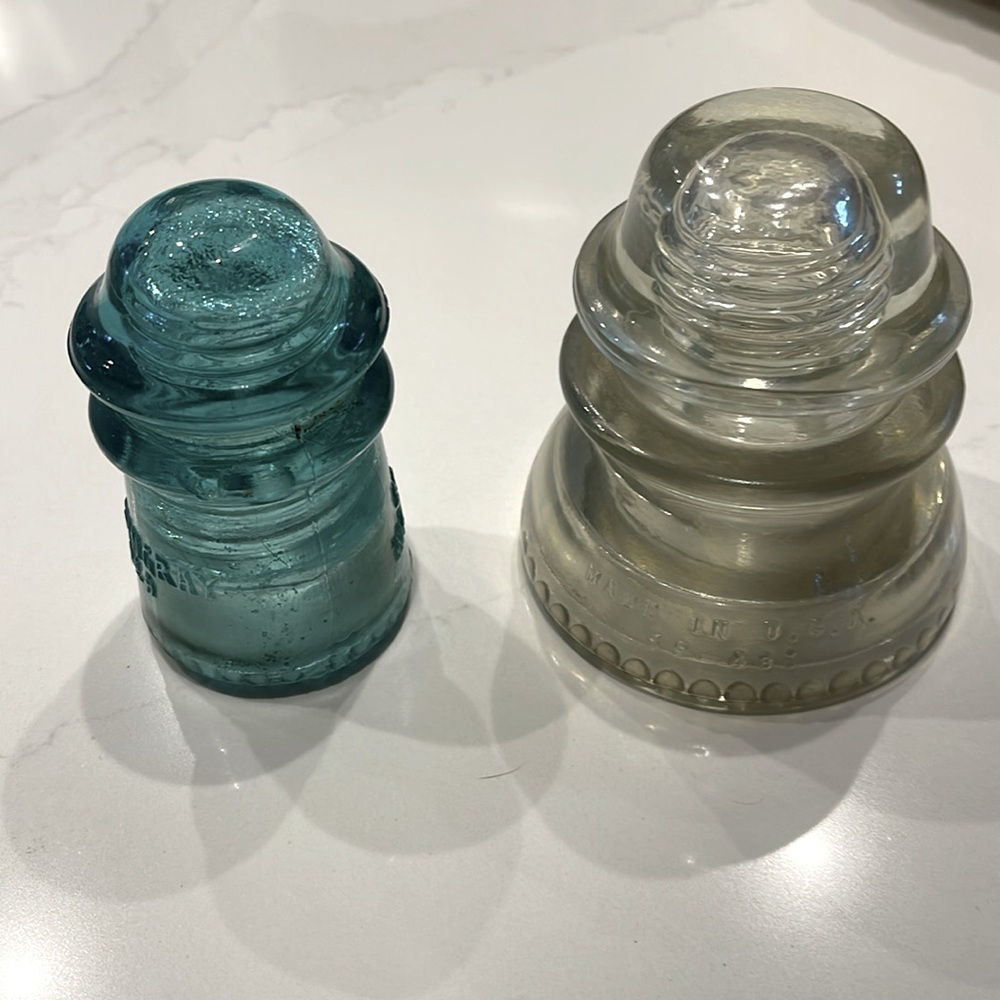 2 glass insulators -aqua #9 and clear #42